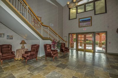 Lobby area with seating and staircase