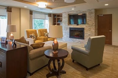 Cozy common area with seating and fireplace