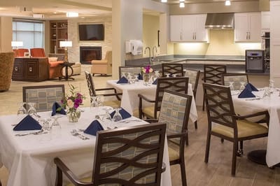 Dining area with elegantly set tables and modern decor