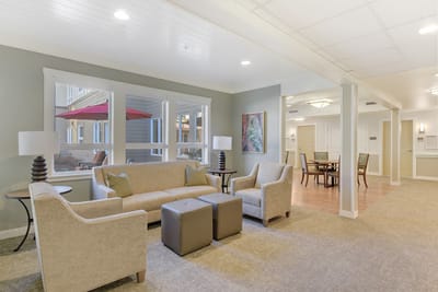 Bright common area with seating and artwork