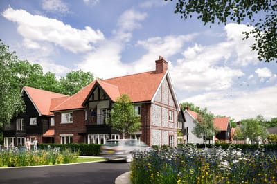 Exterior view of a senior living facility with gardens