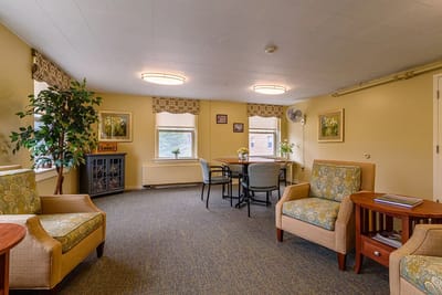Bright common area with seating and decorations