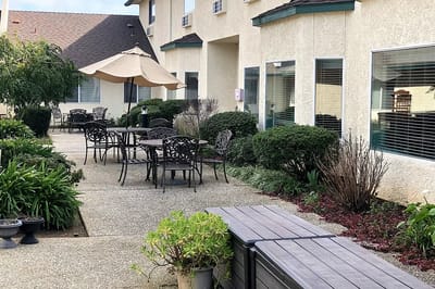 Serene courtyard with seating for residents