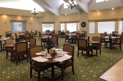Dining room with tables set for meals