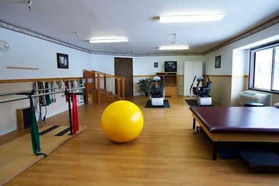 Interior view of a therapy room with equipment