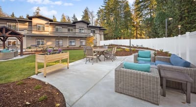 Outdoor space with seating and building in background