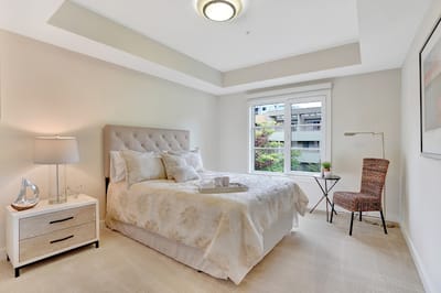 A well-furnished private resident room with natural light