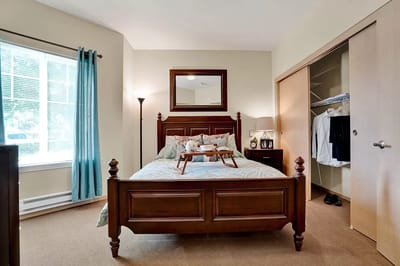 Cozy resident room with a bed and window
