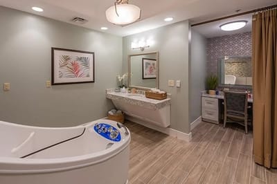 Modern bathroom with a tub and a vanity