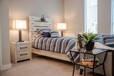 Cozy interior room with a bed and modern decor