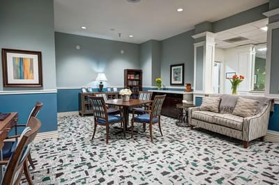 Bright common area with seating and decor