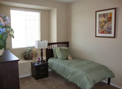 Cozy private room with bed and decorations