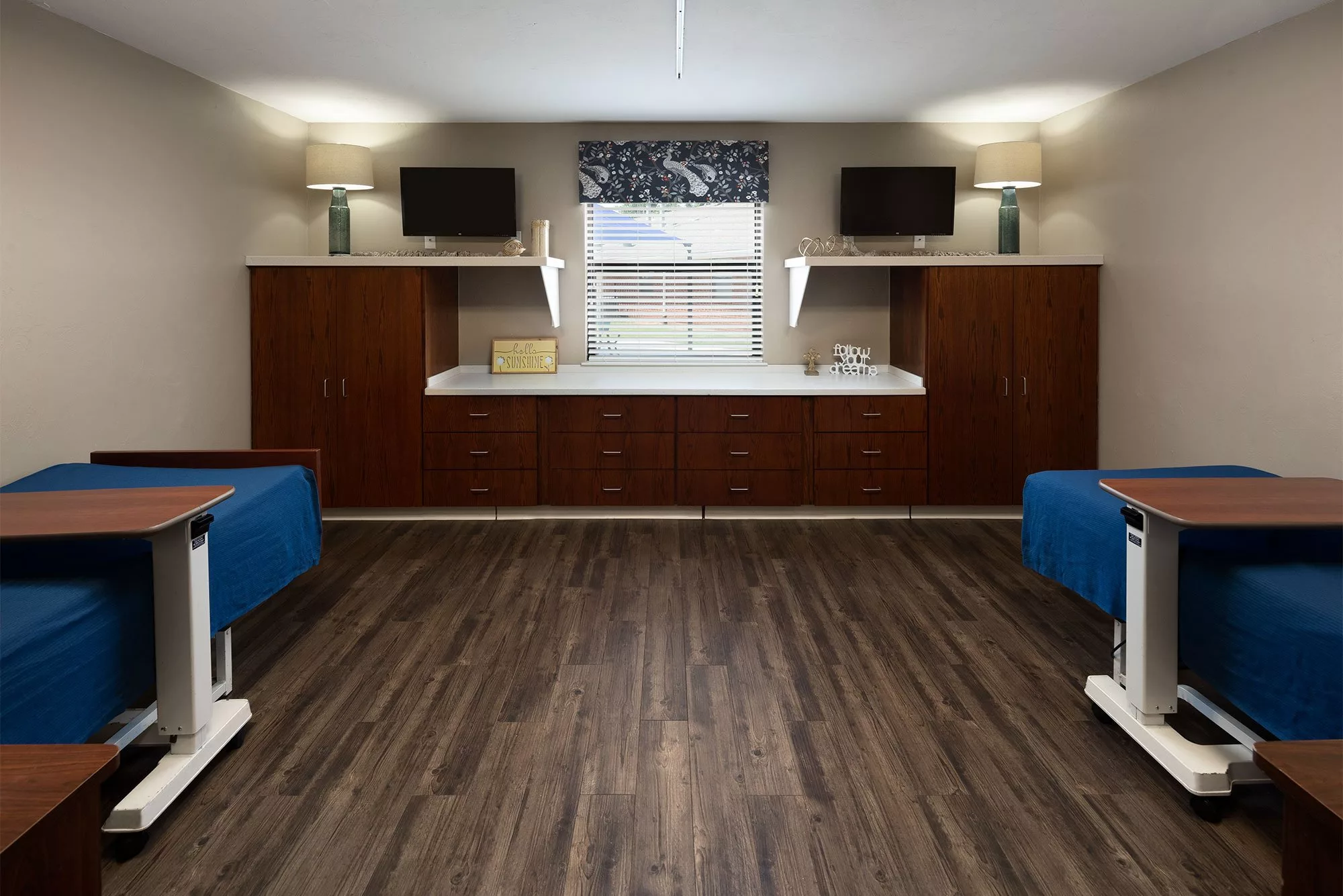 Interior view of a shared resident room with beds