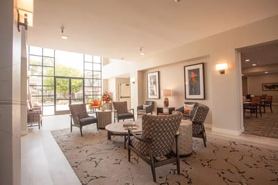 Bright common area with seating and natural light
