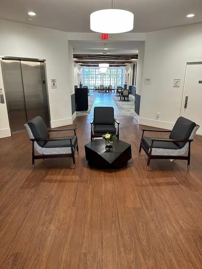 Interior common area with seating and natural light