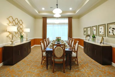 Bright dining room with elegant decor and table settings