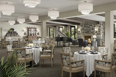 Elegant dining room setup with piano and light decor