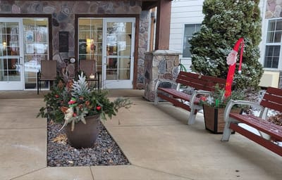 Exterior view of Wildwood Grove entrance decorated for holidays