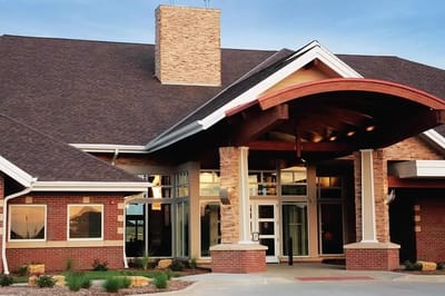 Exterior view of Woodlands Creek Senior Living building