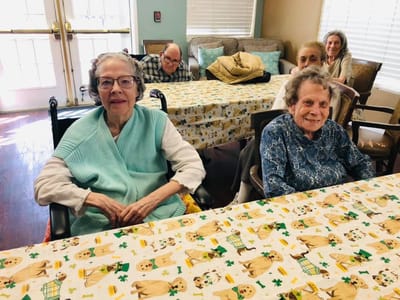 Residents participating in a group setting at the facility