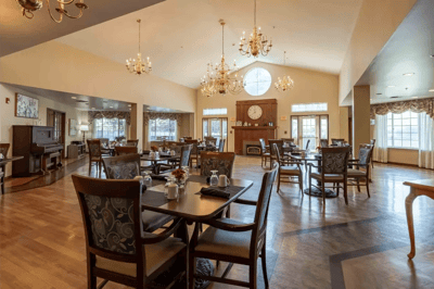 Bright dining room with tables set for meals