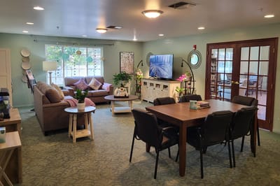 Cozy common area with seating and TV
