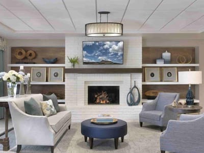 Bright common area with comfortable seating and decor