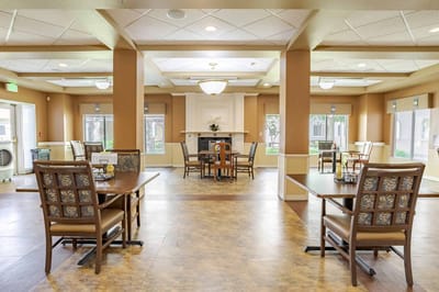 Interior view of a common area with tables and chairs
