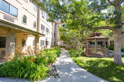 Pathway through a landscaped garden with gazebo