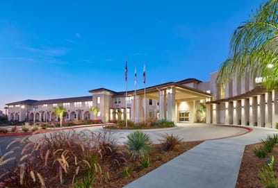 Exterior view of Ivy Park at Otay Ranch at dusk