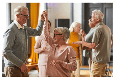 Residents enjoying a dance party in a common area