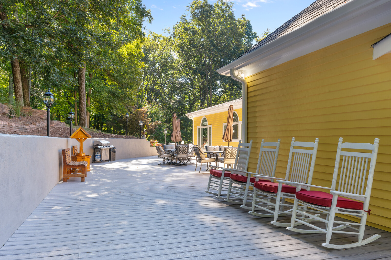 Outdoor seating area with rocking chairs