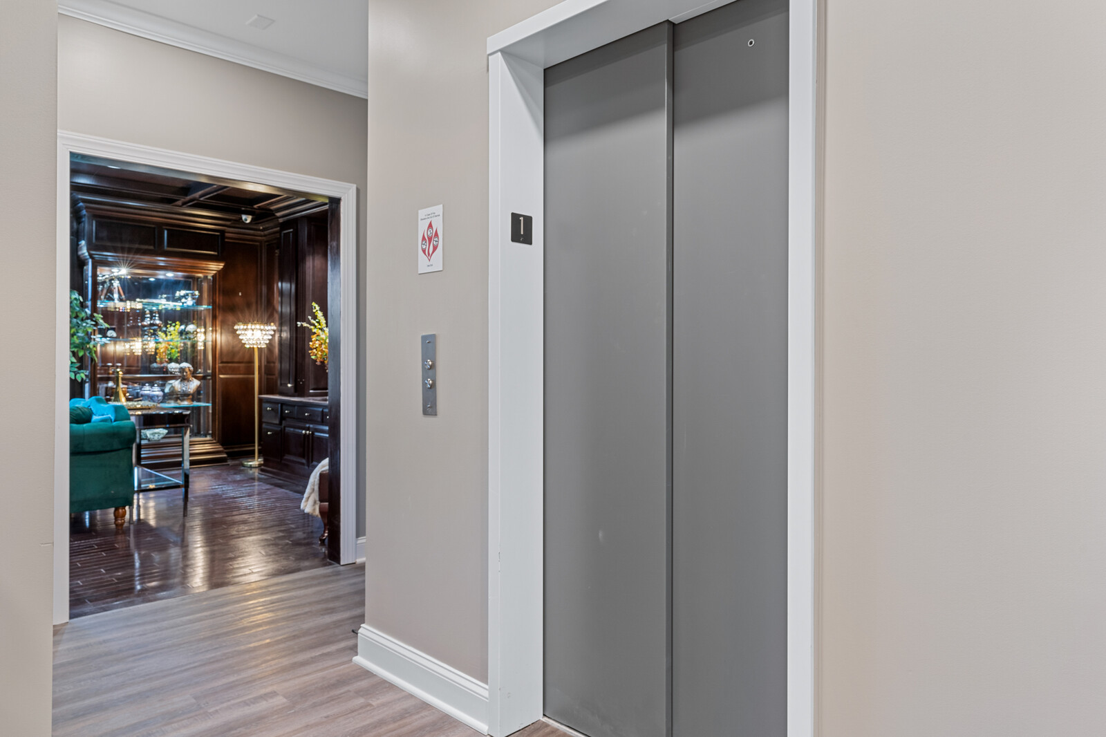 Elevator with hall entrance and interior decor visible
