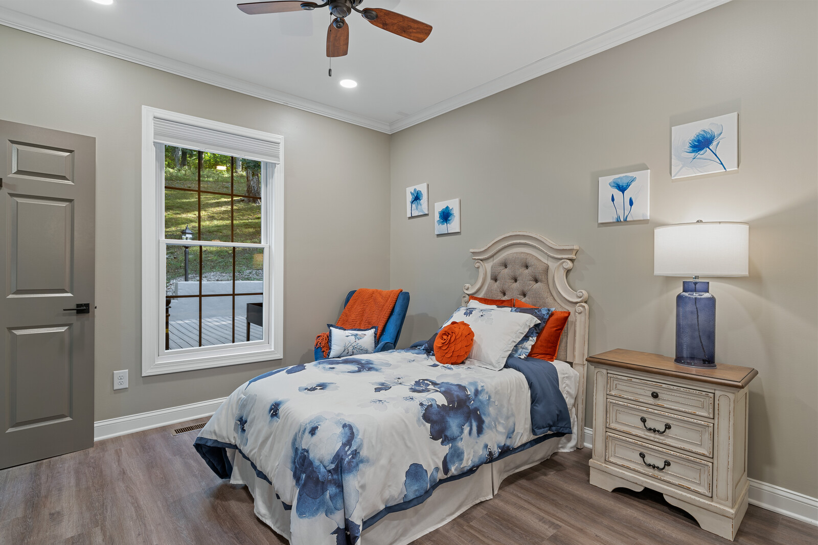 A well-decorated private resident room with floral accents
