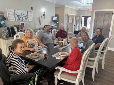 Residents enjoying a meal in the dining area