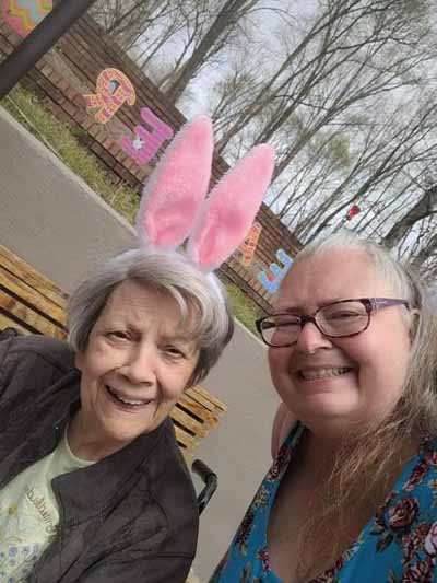 Residents enjoying an outdoor activity with bunny ears