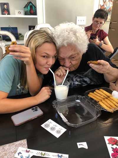 Residents enjoying snacks and drinks together