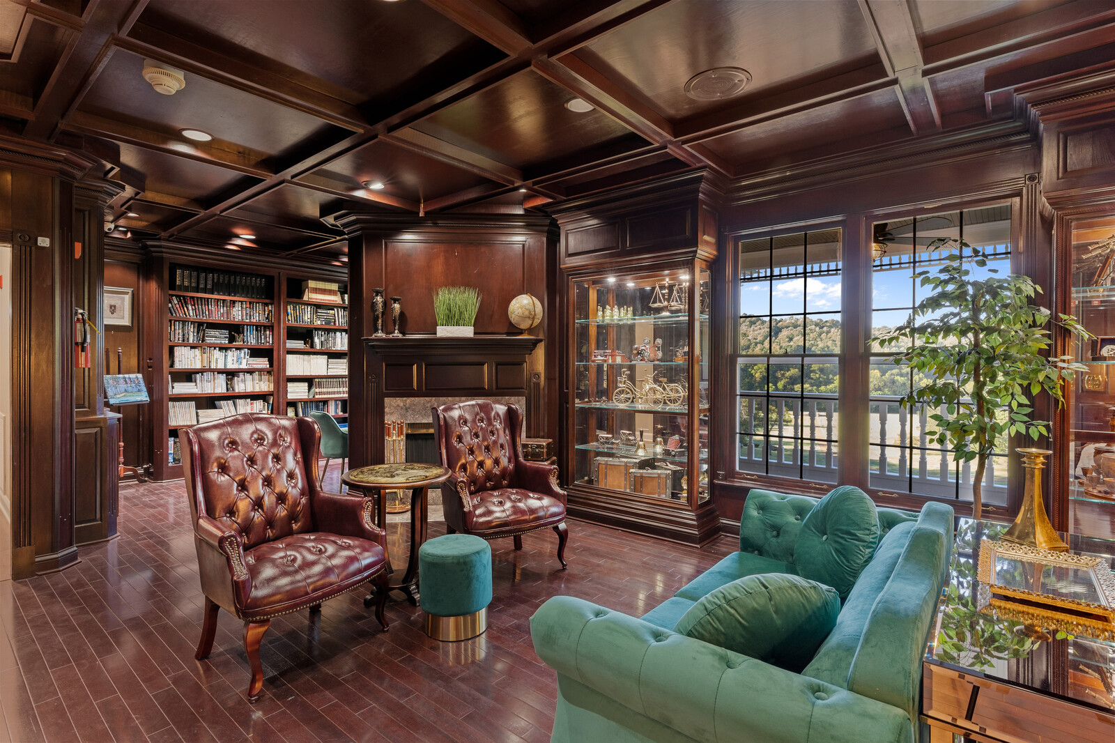 A cozy lounge area with bookshelves and comfortable seating