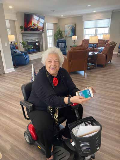 Resident enjoying time in a cozy common area