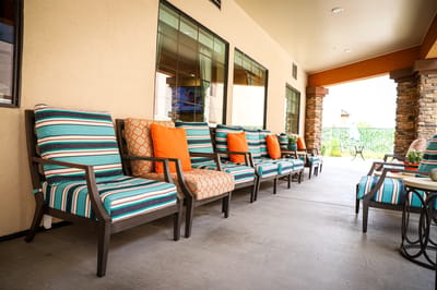 Outdoor seating area with colorful cushions