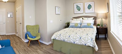 Cozy resident room with bed and decor