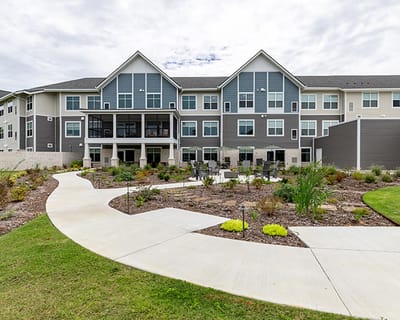 Exterior view of the facility with landscaped garden