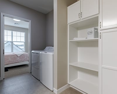 Interior view of a laundry room in a residential unit
