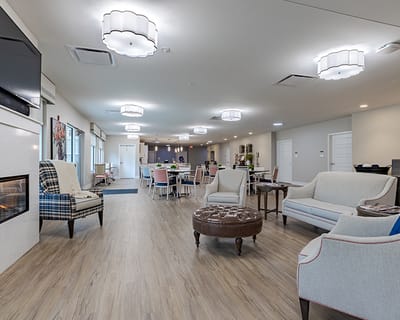 Interior view of a bright common area with seating