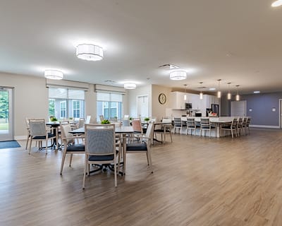 Modern dining room with ample seating and natural light