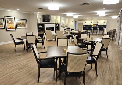 Common area with seating and tables in a stylish lounge
