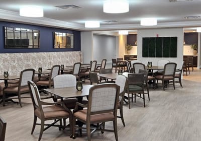 Bright dining room with tables and chairs
