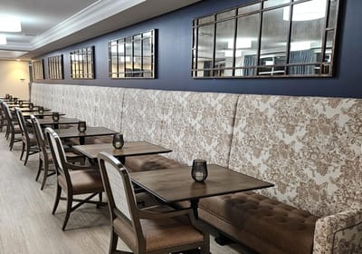 Interior dining area with tables and chairs