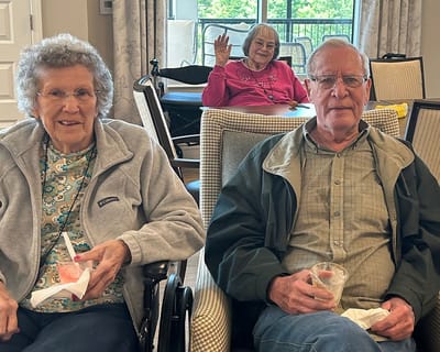 Residents enjoying refreshments in a common area