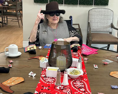 Resident enjoying a themed activity with decorations